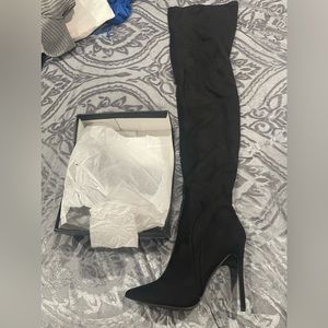 Black heel high boots